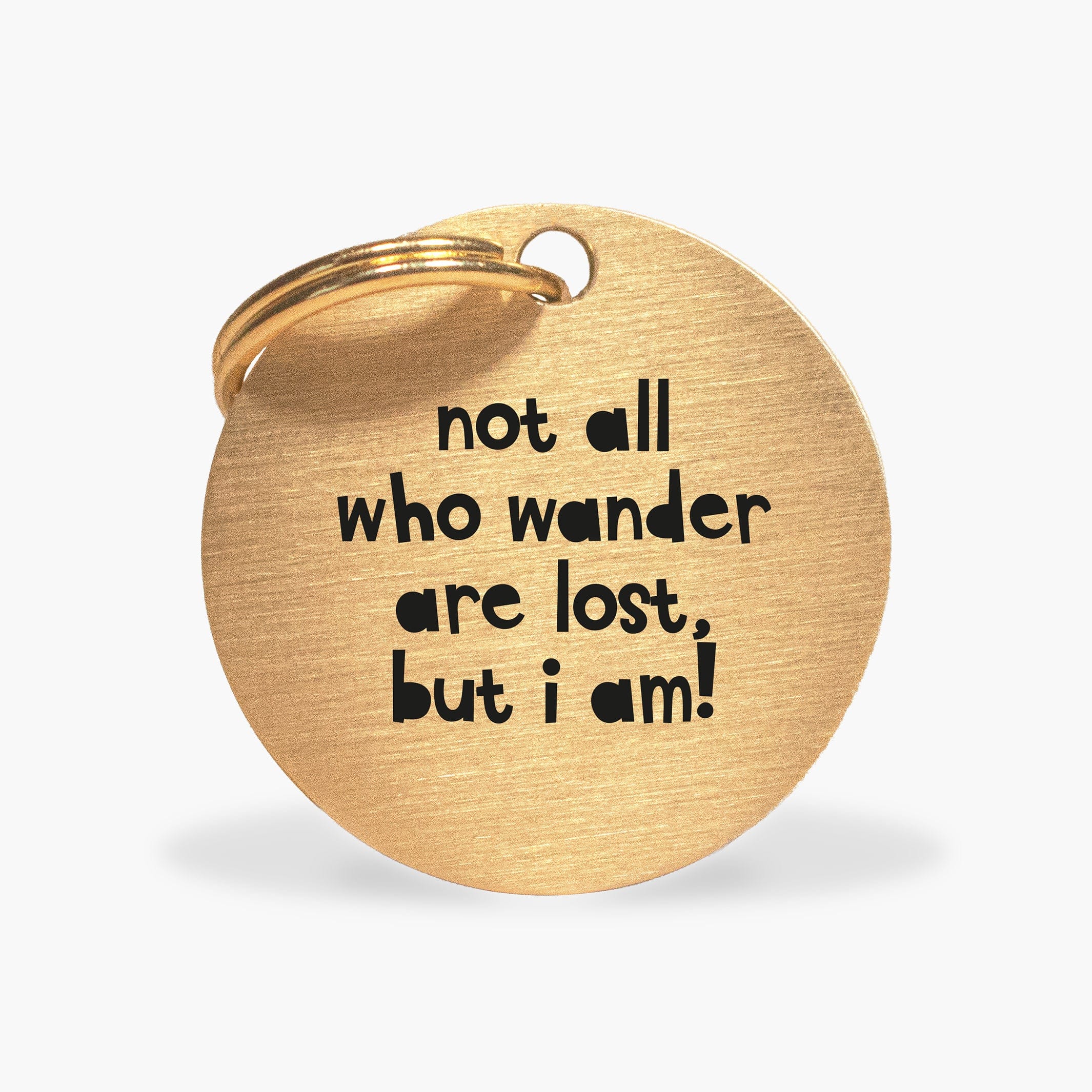 Personalised Gold Brass Dog ID Tag, inscribed with 'Not All Who Wander Are Lost, But I Am! The Stately Hound