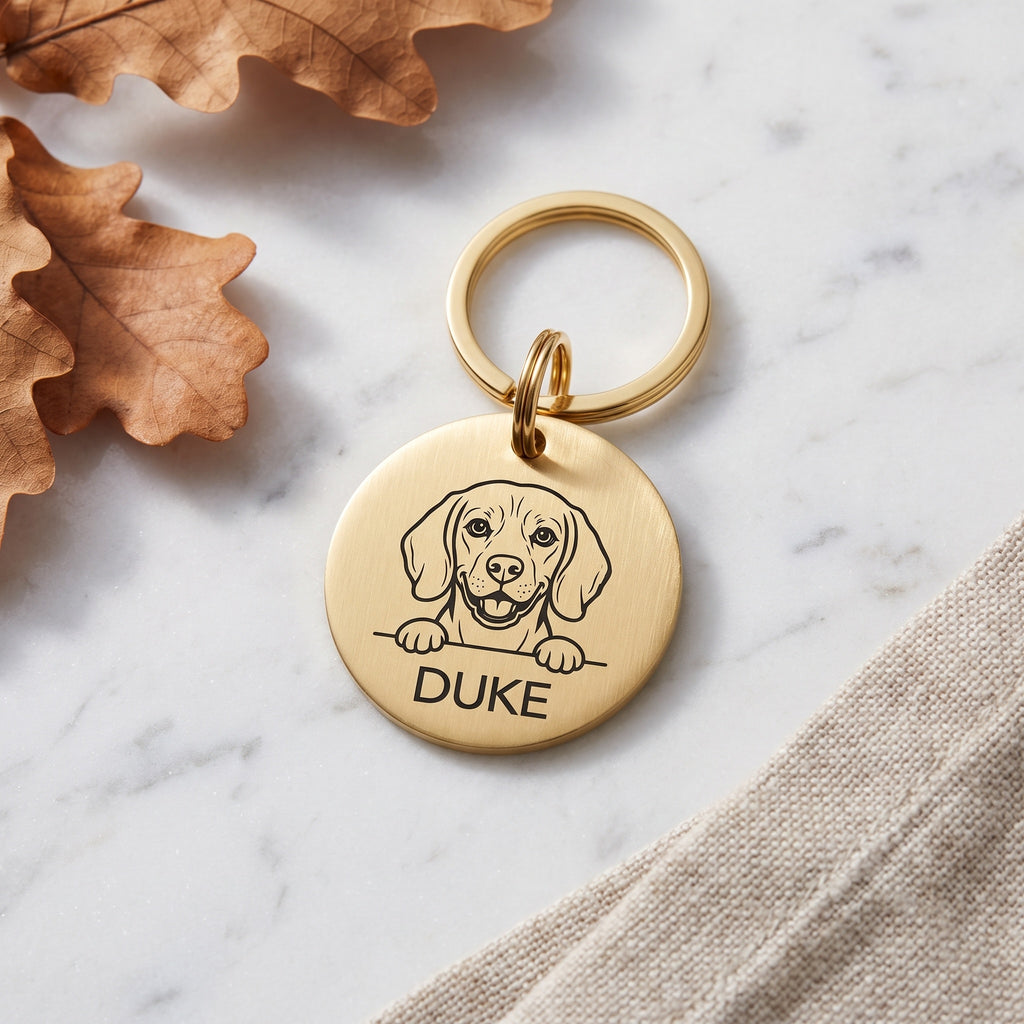 Gold Beagle dog tag engraved with the Beagle design and the name Duke