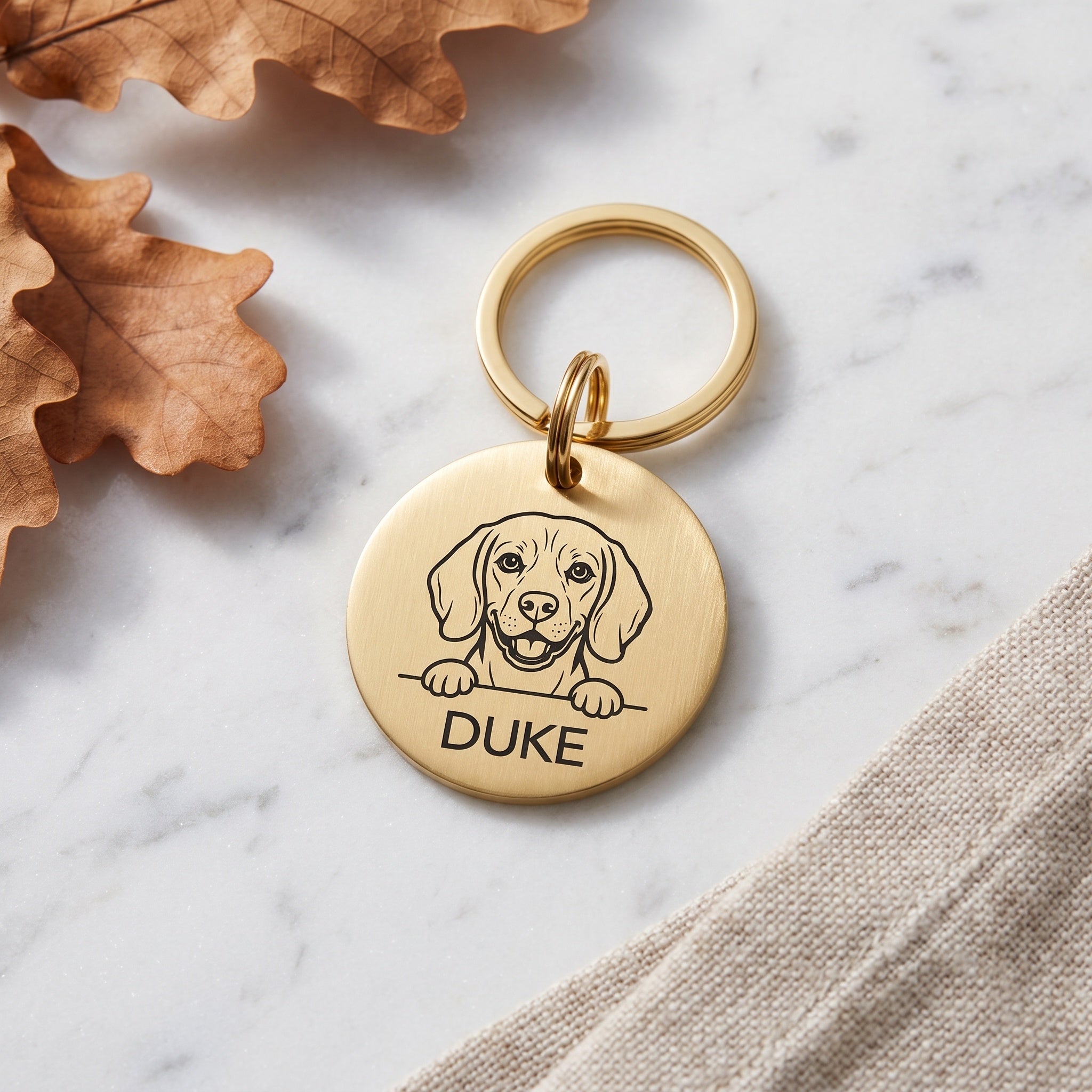 Gold Beagle dog tag engraved with the Beagle design and the name Duke