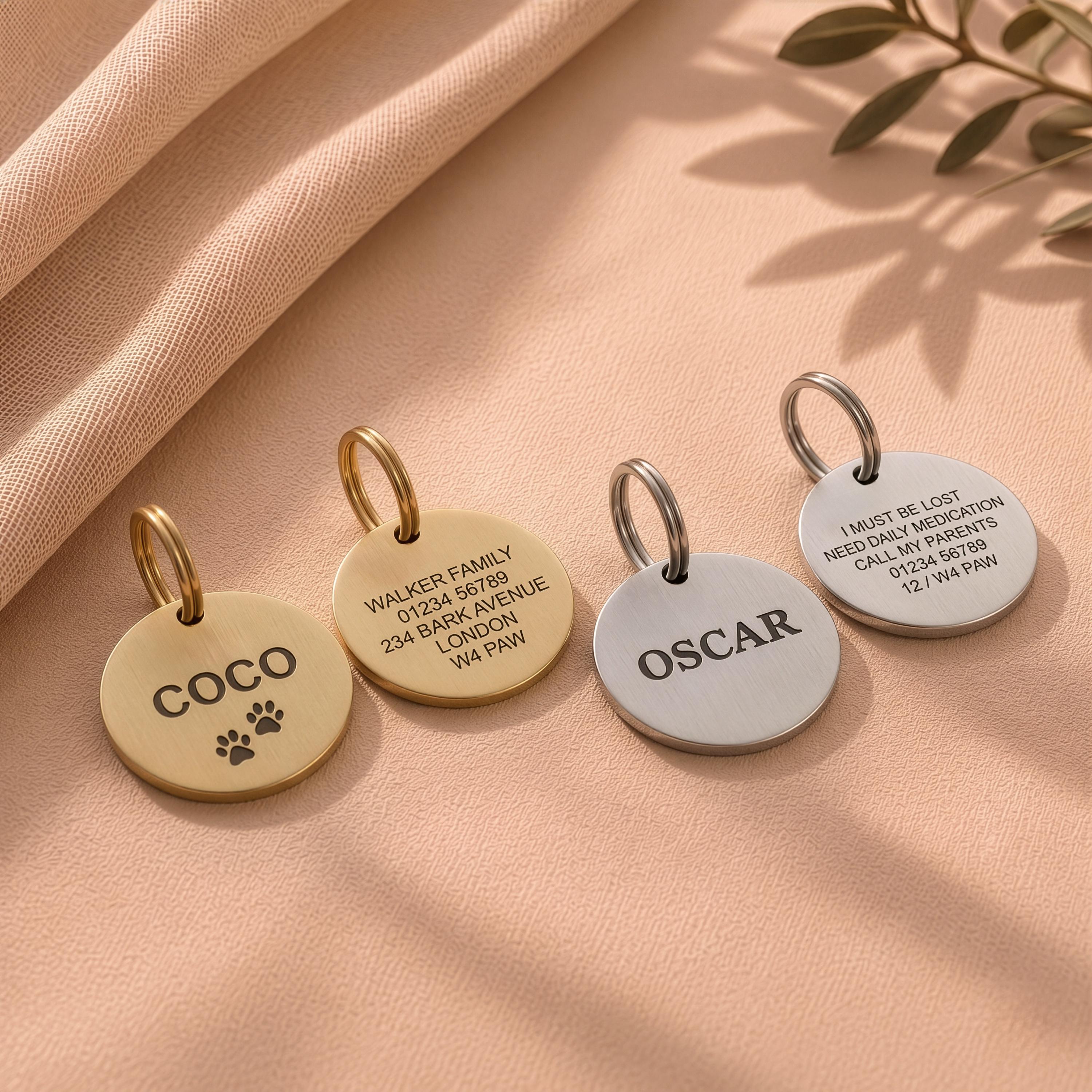 Backs of engraved dog tags showing owner contact detail layouts - name, address and phone number