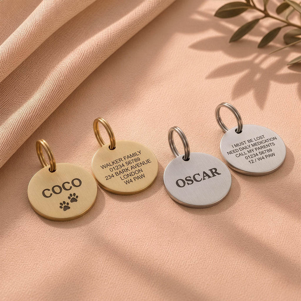 Backs of engraved dog tags showing owner contact detail layouts - name, address and phone number