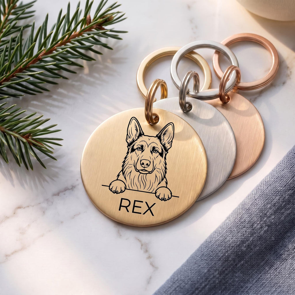 Personalised German Shepherd dog tags in gold, silver and rose gold, fanned to show all three brushed finishes