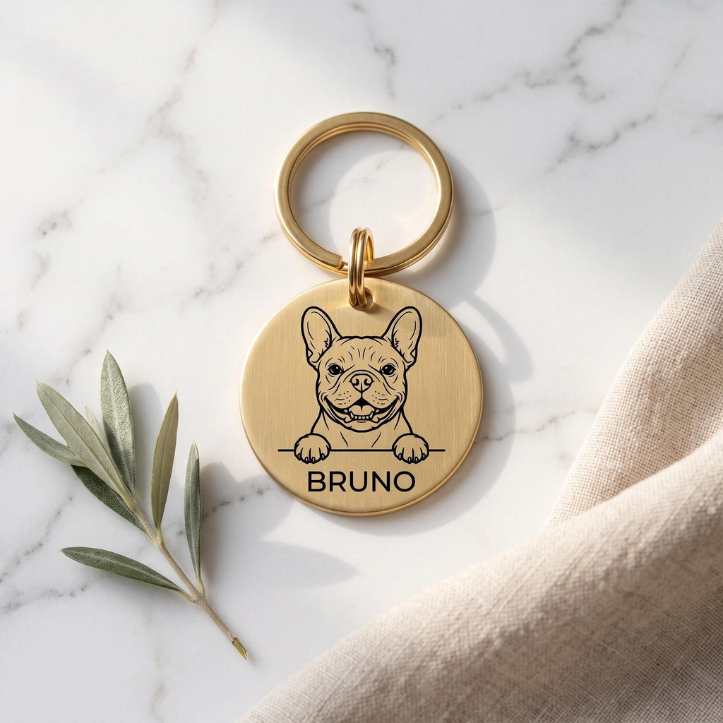 Gold French Bulldog dog tag engraved with the French Bulldog design and the name BRUNO