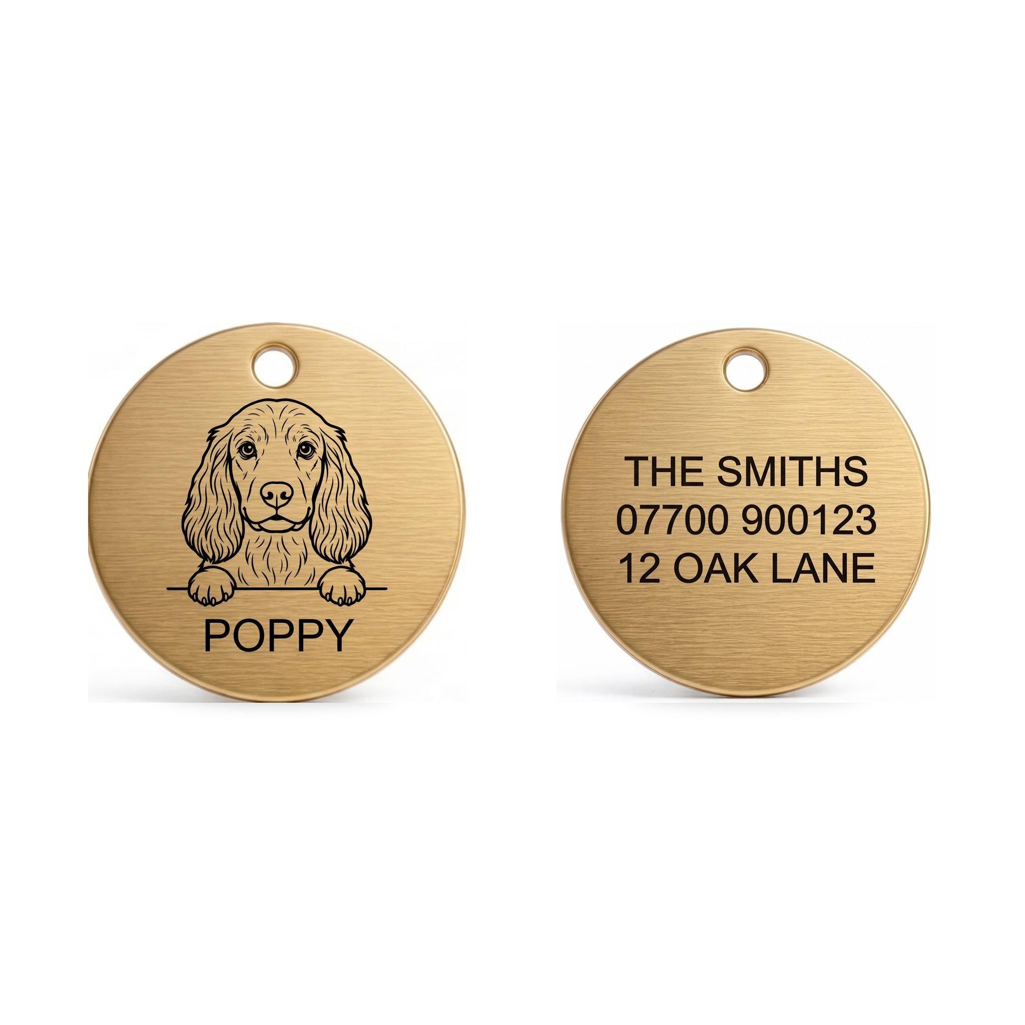 Front and back of the Cocker Spaniel dog tag: breed design and name on the front, contact details on the back
