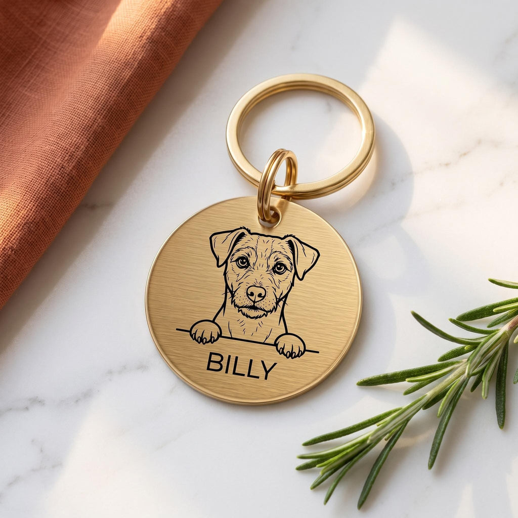Gold Jack Russell dog tag engraved with the Jack Russell design and the name BILLY