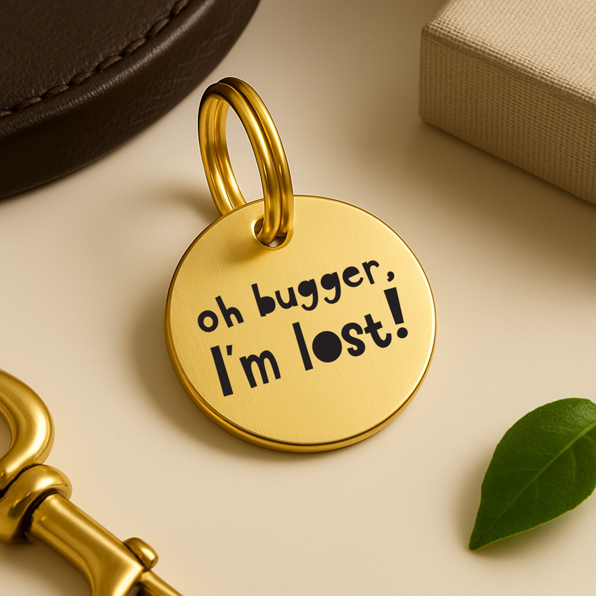 Personalised Dog ID Tag with Engraved Contact Details - Oh Bugger I'm Lost in Gold Coloured Brass