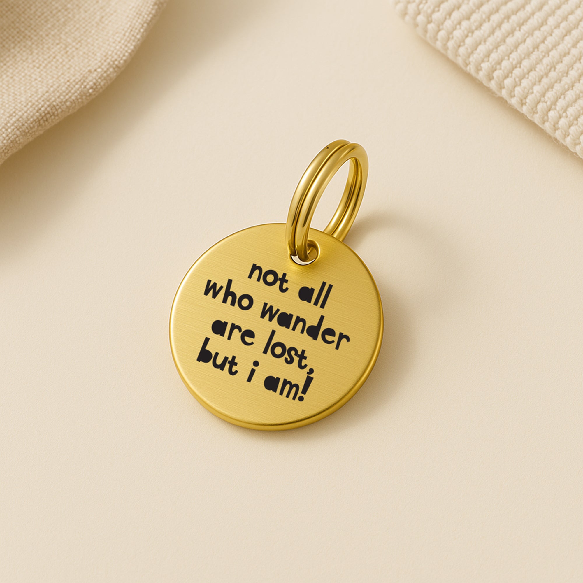Personalised Gold Brass Dog ID Tag, inscribed with 'Not All Who Wander Are Lost, But I Am!