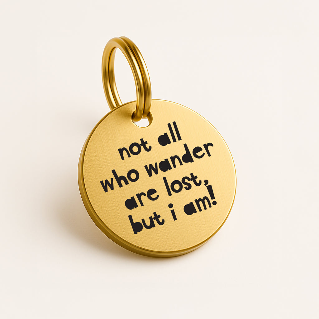 Personalised Gold Brass Dog ID Tag, inscribed with 'Not All Who Wander Are Lost, But I Am!