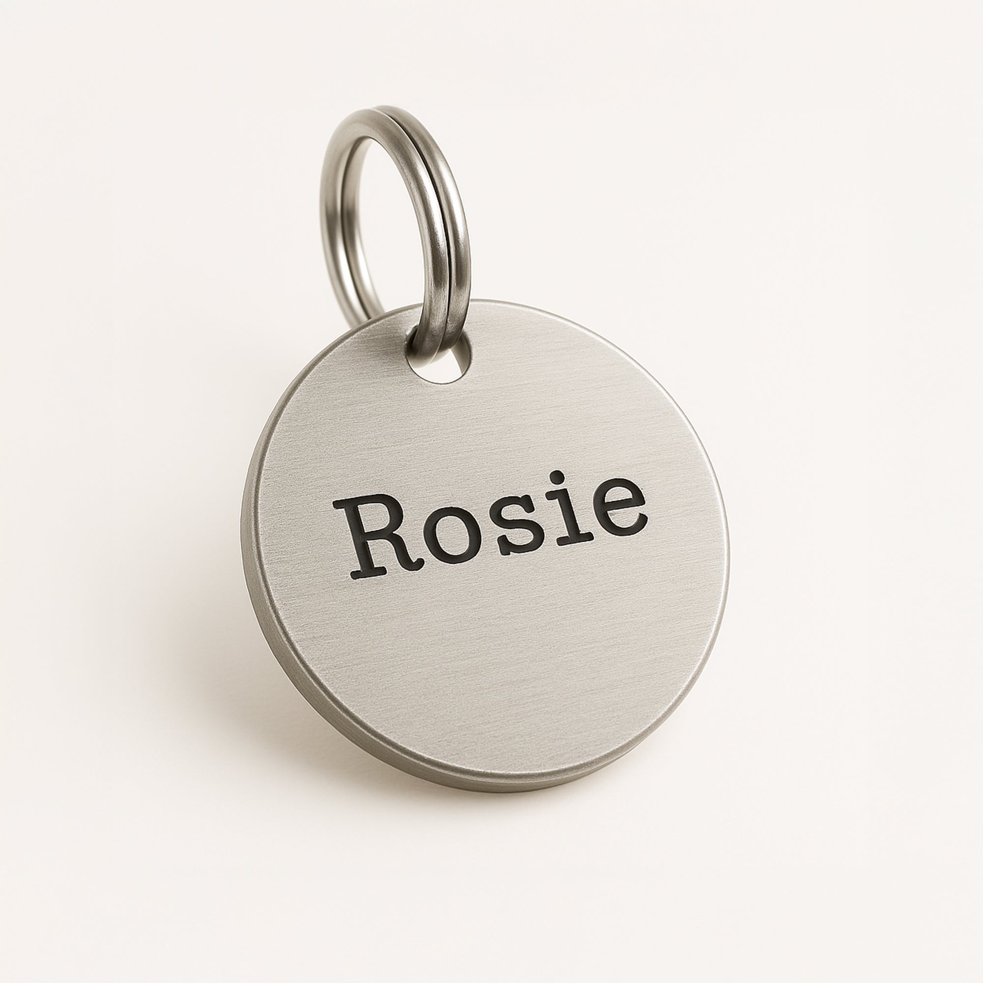 Personalised Silver ID Dog Name Tag Engraved with Typewriter Font & Bone Design in Stainless Steel The Stately Hound