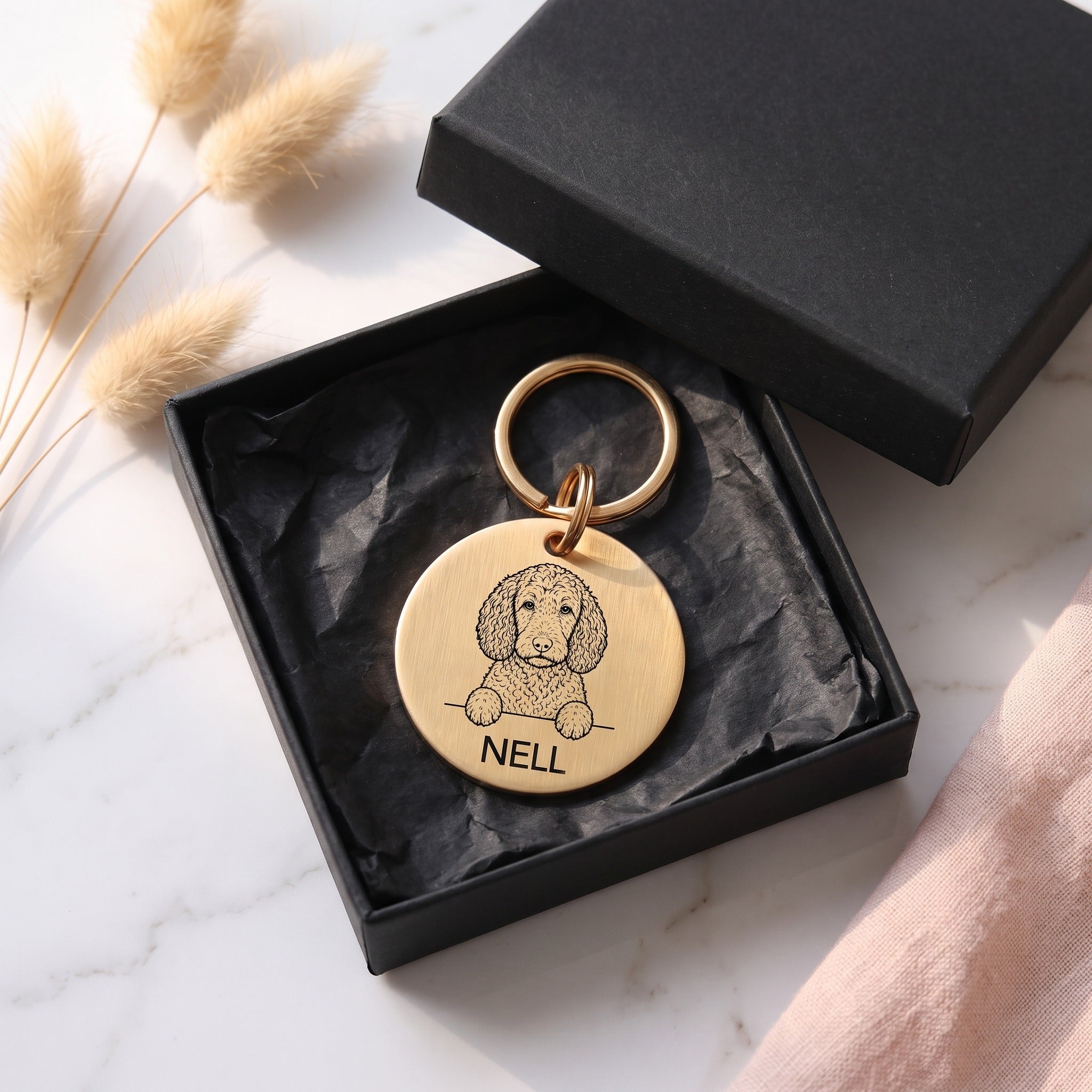 Personalised Sproodle dog tag presented in the optional gift box
