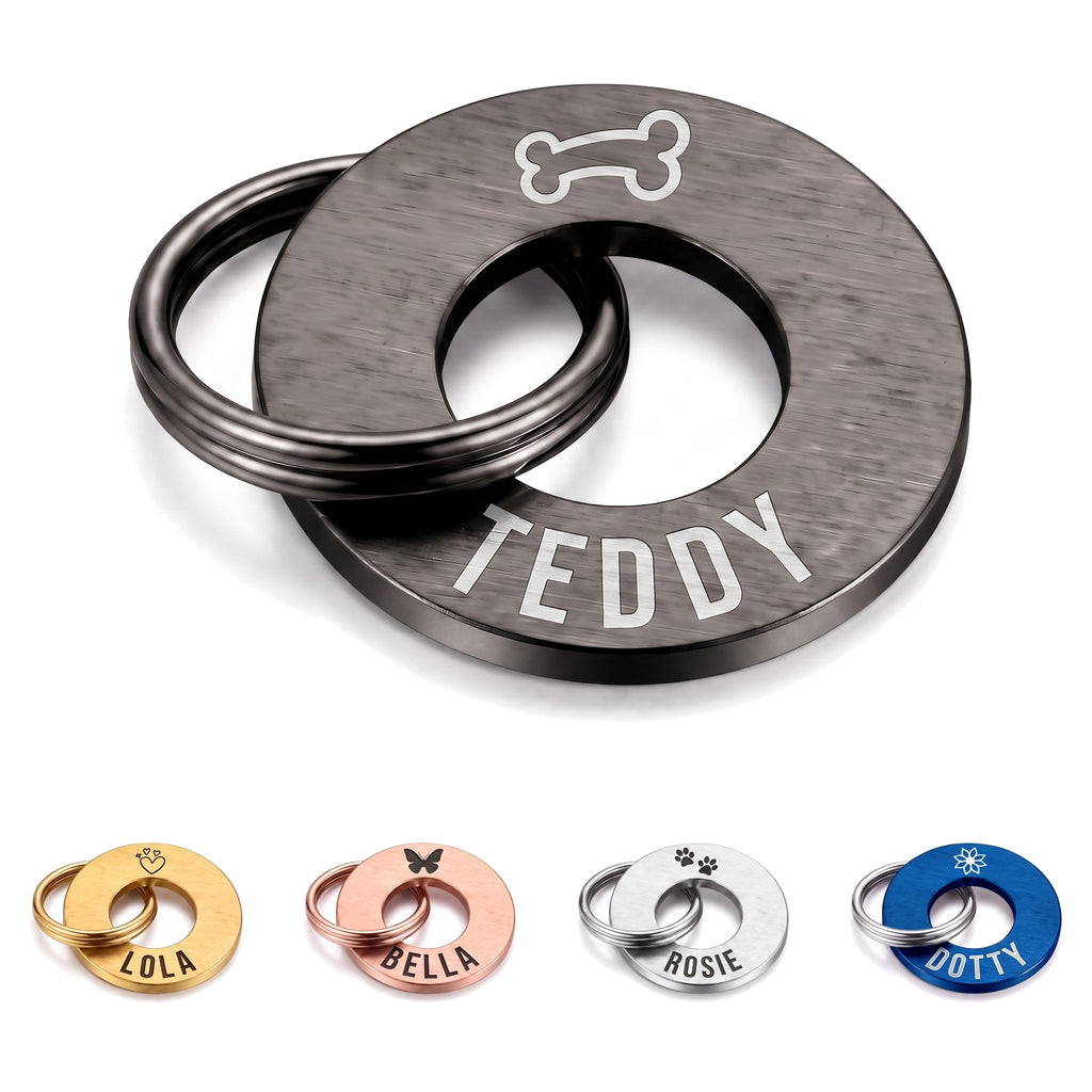 Personalised black washer dog tag engraved with a name and symbol, split ring fitted
