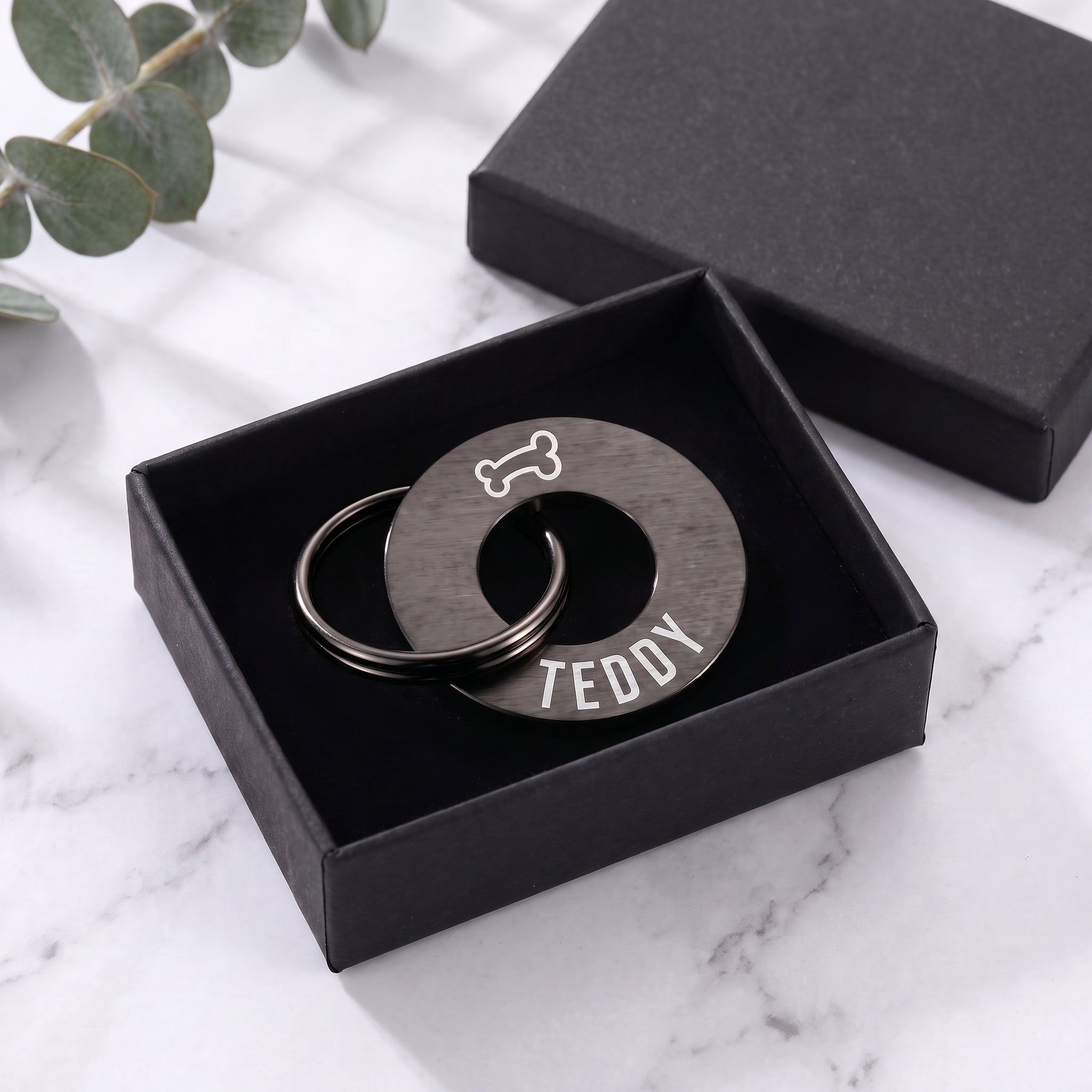Black washer dog tag in its matte black gift box