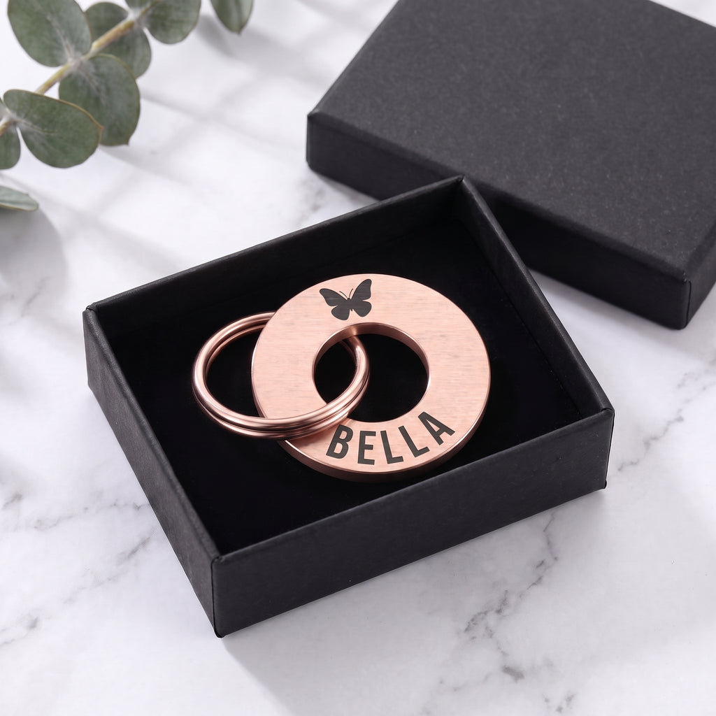 Rose gold washer dog tag in its matte black gift box
