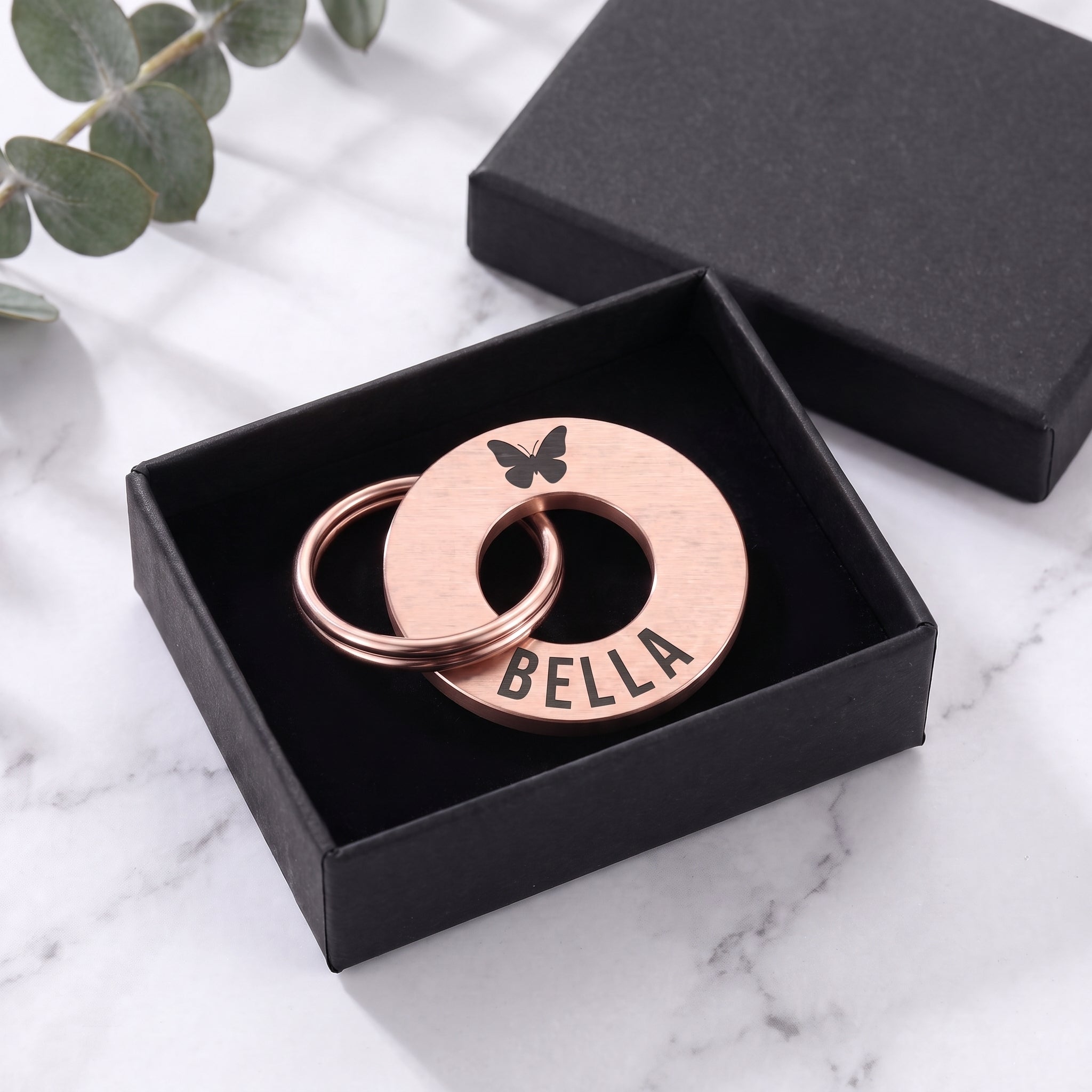 Rose gold washer dog tag in its matte black gift box
