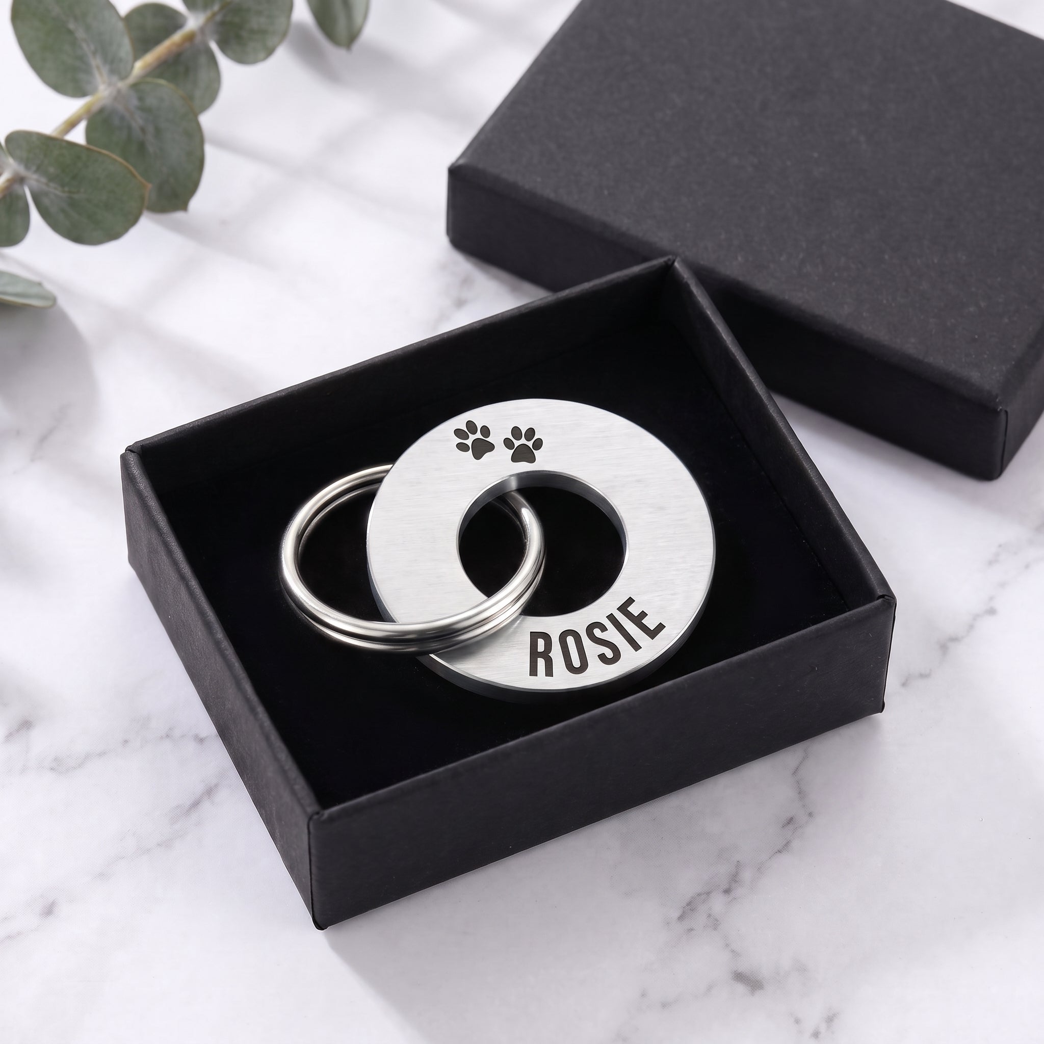 Silver washer dog tag in its matte black gift box