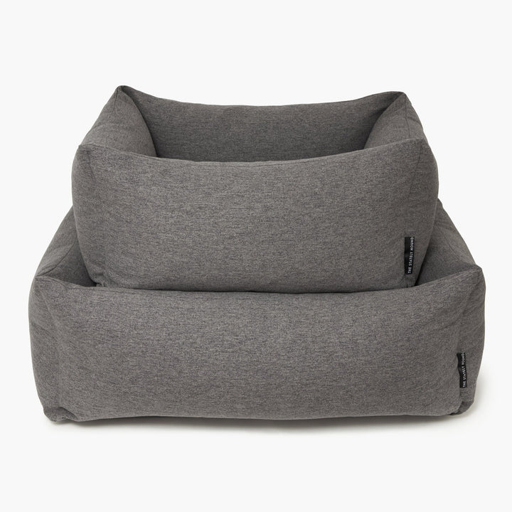 Luxury Grey Dog Bed with Raised Bolsters: The Perfect Place for Your Pet to Relax